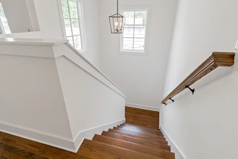a view of entryway with wooden floor