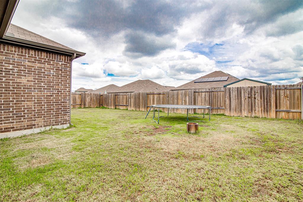 1813 Rialto Lane Crowley, TX 76036 - Photo 27 of 27 a view of a house with garden and balcony