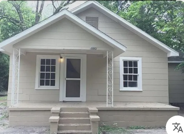 a front view of a house with windows