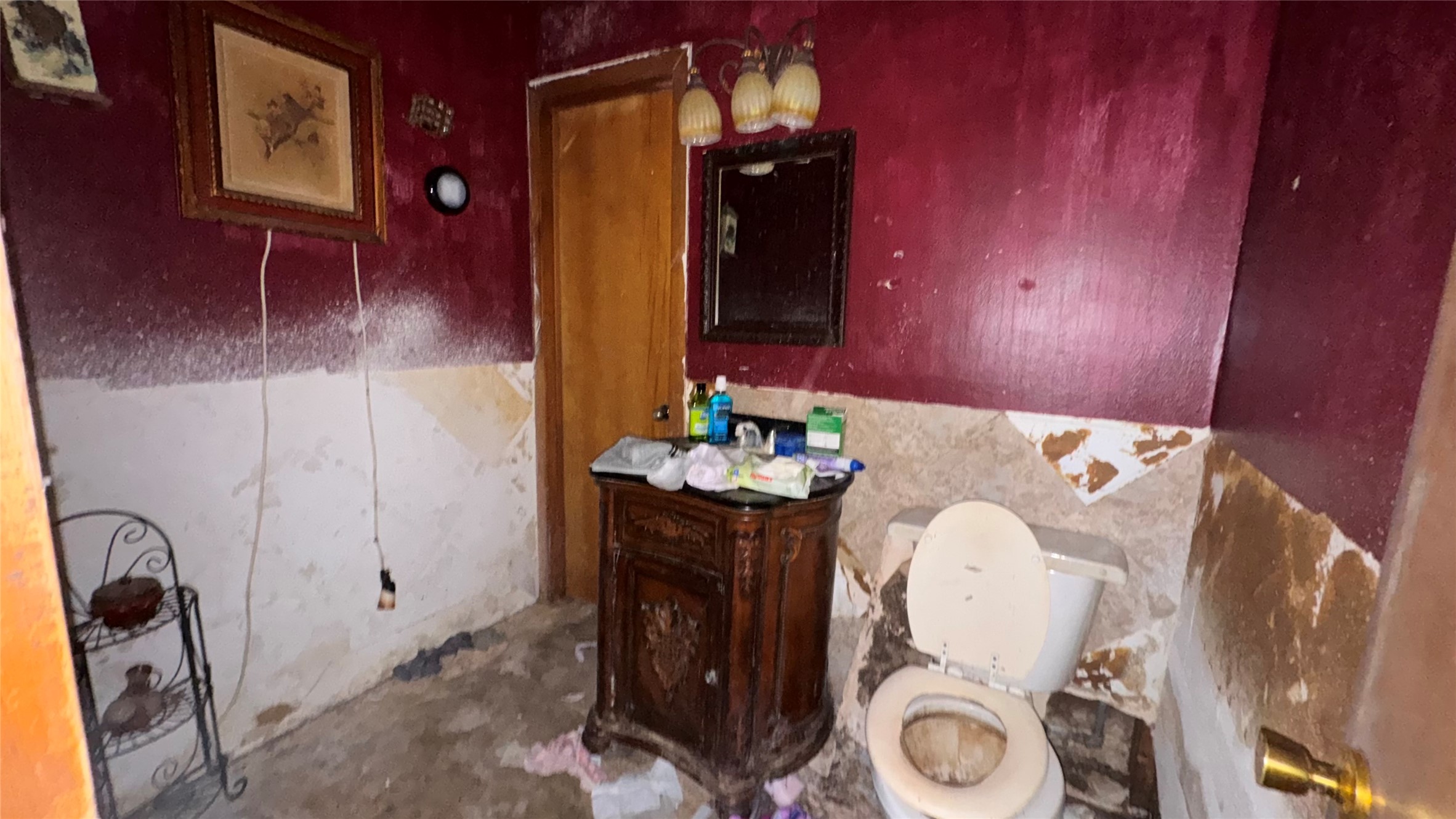1111 Avenue B Sweeny, TX 77480 - Photo 14 of 17 a bathroom with a mirror a sink and a mirror