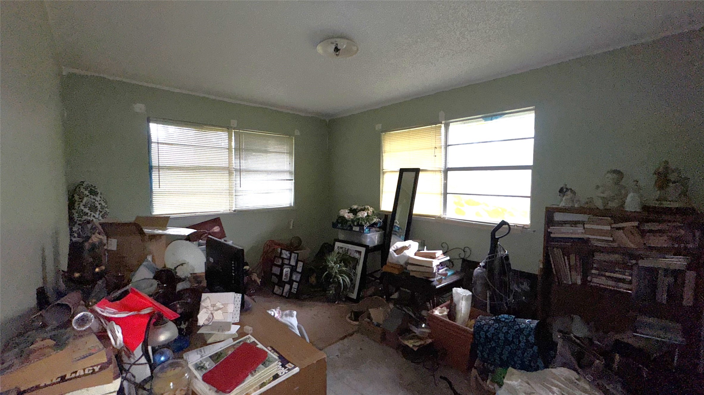 1111 Avenue B Sweeny, TX 77480 - Photo 10 of 17 a room with gym equipment and a window