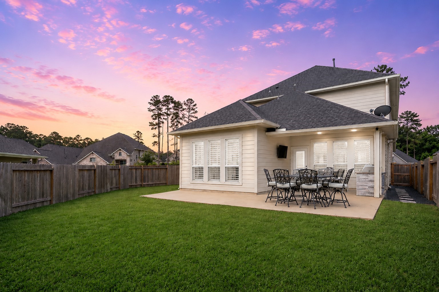 304 Mullins Court Montgomery, TX 77316 - Photo 35 of 50 The patio was extended making summer nights a breeze with the built-in grill and mounted TV.