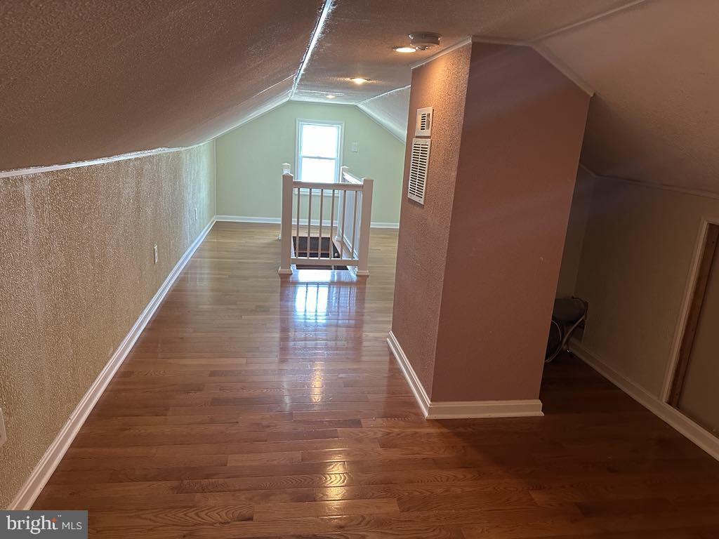 308 Pinewood Road Baltimore, MD 21222 - Photo 16 of 21 a view of gallery with wooden floor
