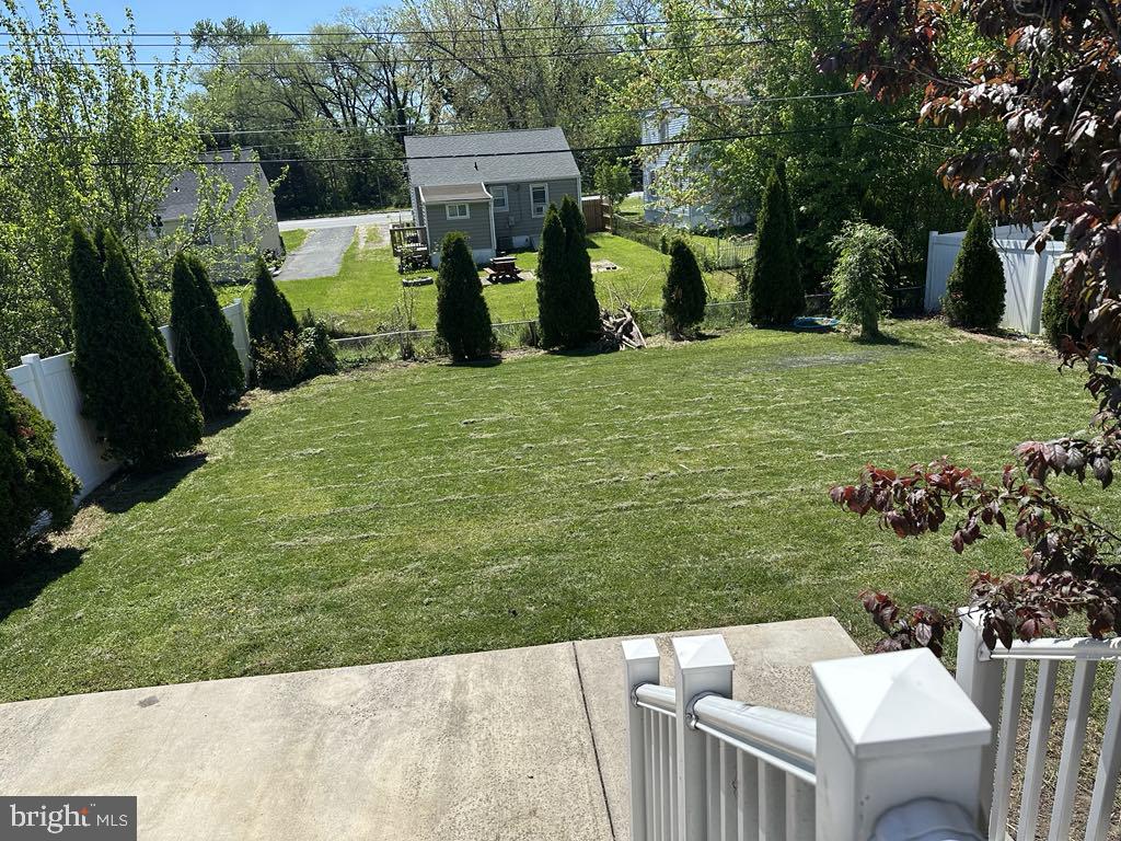 308 Pinewood Road Baltimore, MD 21222 - Photo 20 of 21 a view of a backyard with sitting area