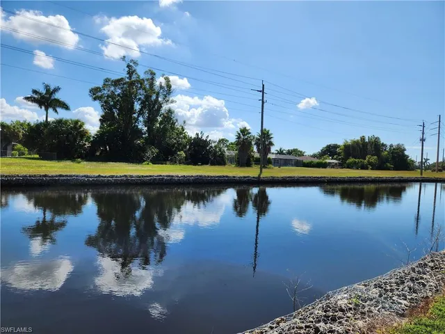 a view of swimming pool with a yard