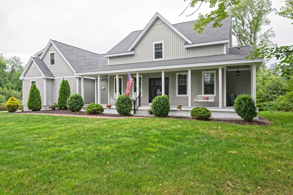 146 7 Bridge Road Lancaster, MA 01523 - Photo 1 of 42 a view of a yard in front of house