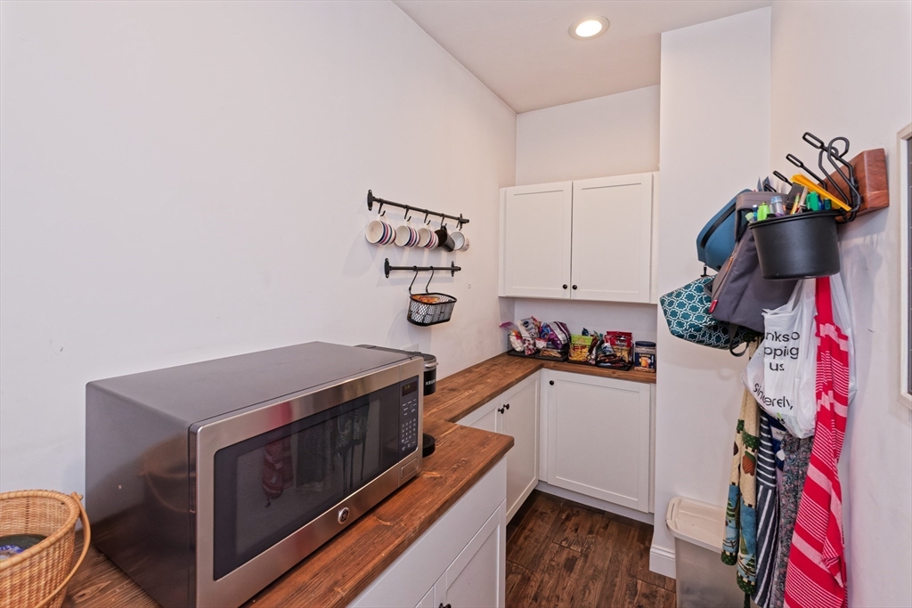 146 7 Bridge Road Lancaster, MA 01523 - Photo 14 of 42 a kitchen with stainless steel appliances granite countertop a stove and a sink