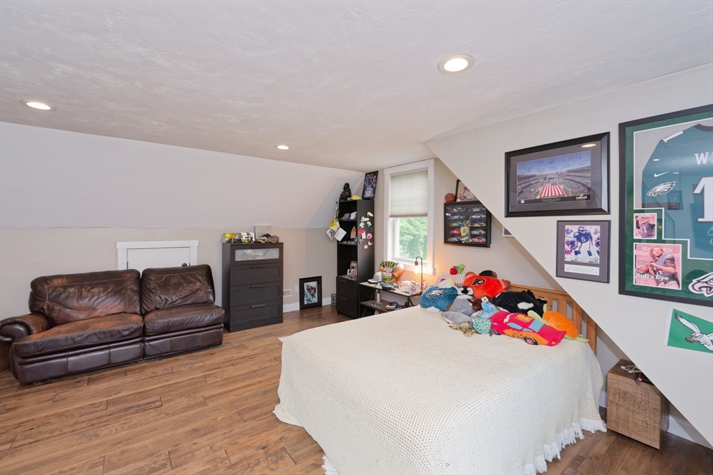 146 7 Bridge Road Lancaster, MA 01523 - Photo 29 of 42 a living room with furniture and furniture