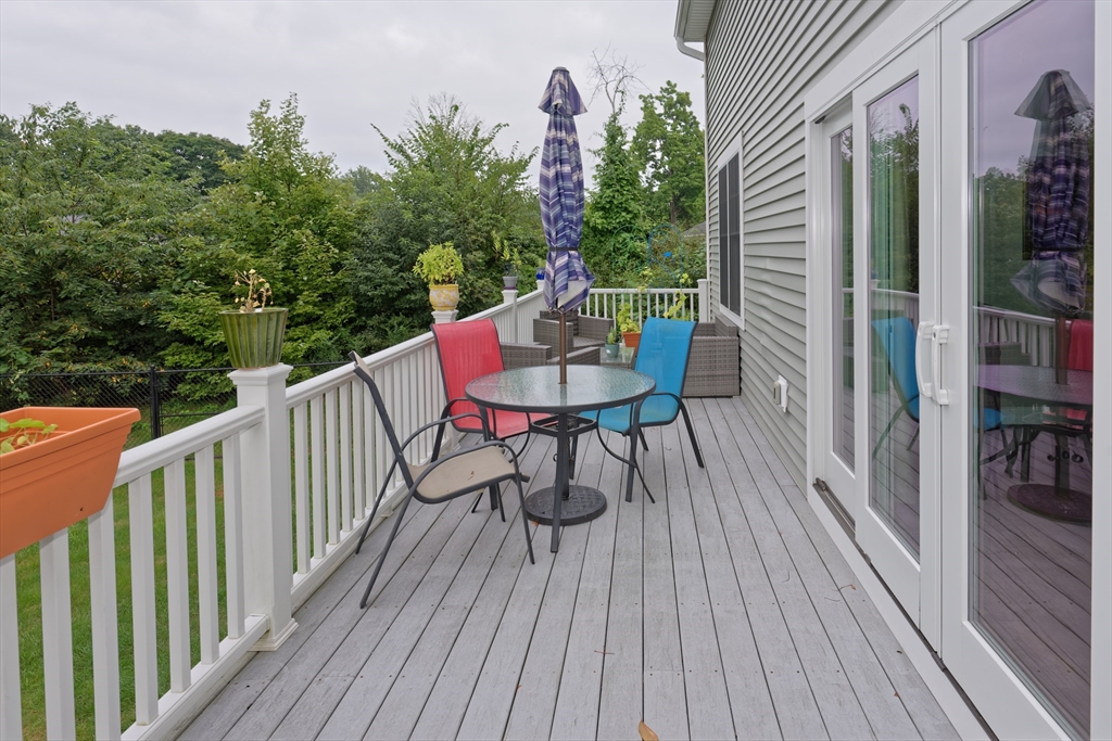 146 7 Bridge Road Lancaster, MA 01523 - Photo 38 of 42 a view of a balcony with furniture