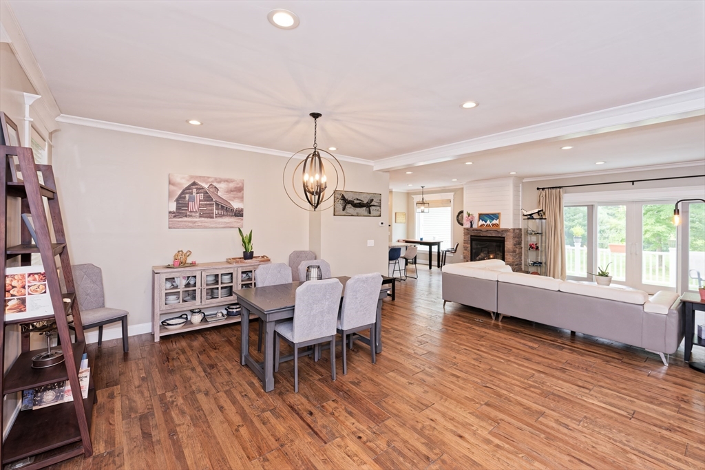 146 7 Bridge Road Lancaster, MA 01523 - Photo 4 of 42 a view of a dining room with furniture window and wooden floor