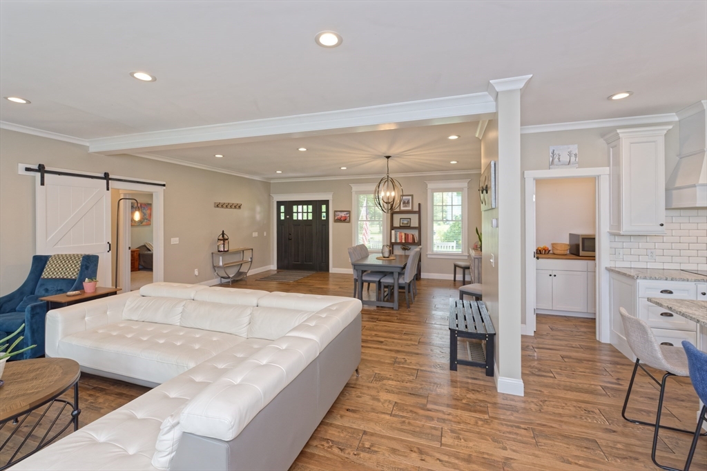 146 7 Bridge Road Lancaster, MA 01523 - Photo 5 of 42 a living room with furniture and wooden floor