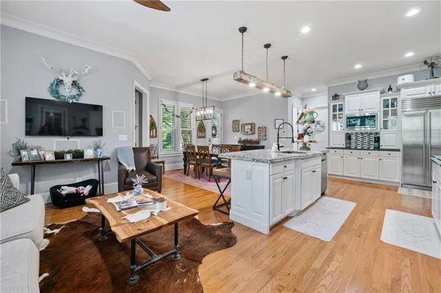 a bathroom with a sink a vanity and a mirror