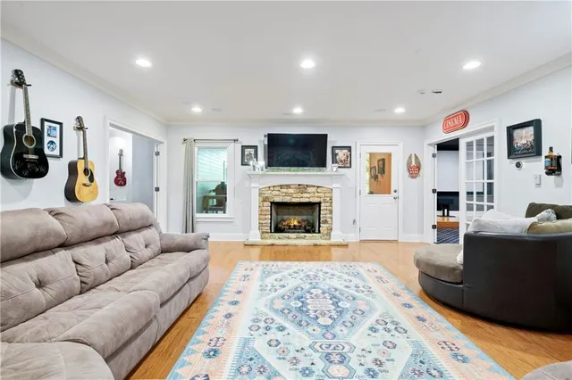 an aerial view of a houses with a yard