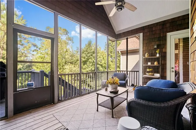 a bedroom with a bed and a table