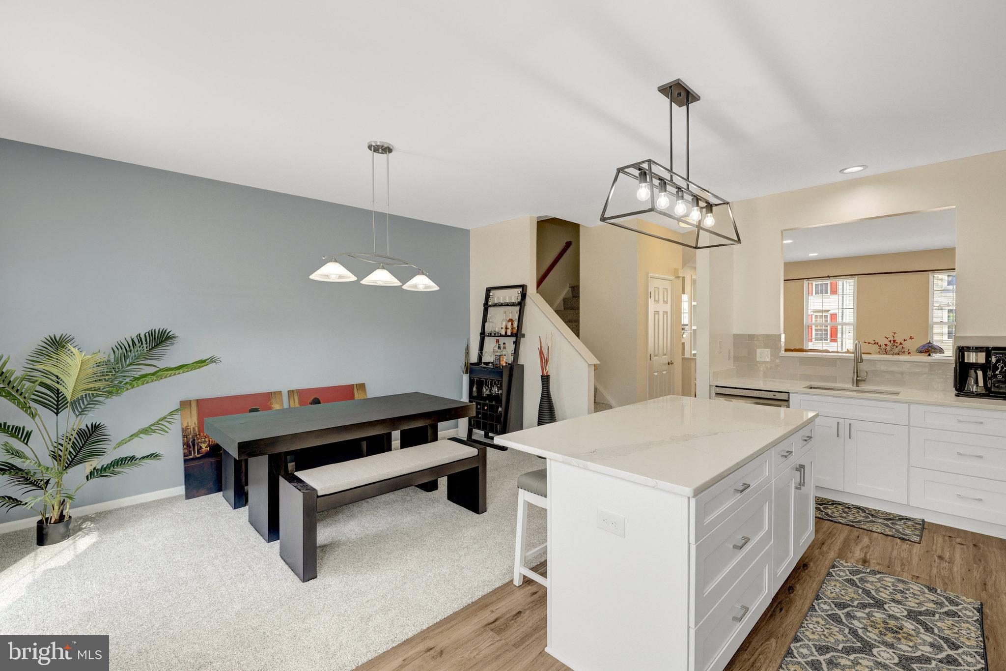 45509 Trail Run Terrace Sterling, VA 20164 - Photo 26 of 64 a very nice looking room with a table and chairs