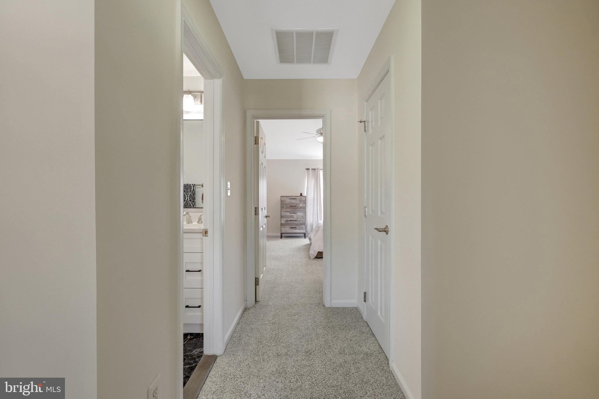 45509 Trail Run Terrace Sterling, VA 20164 - Photo 38 of 64 a view of a bathroom from a hallway
