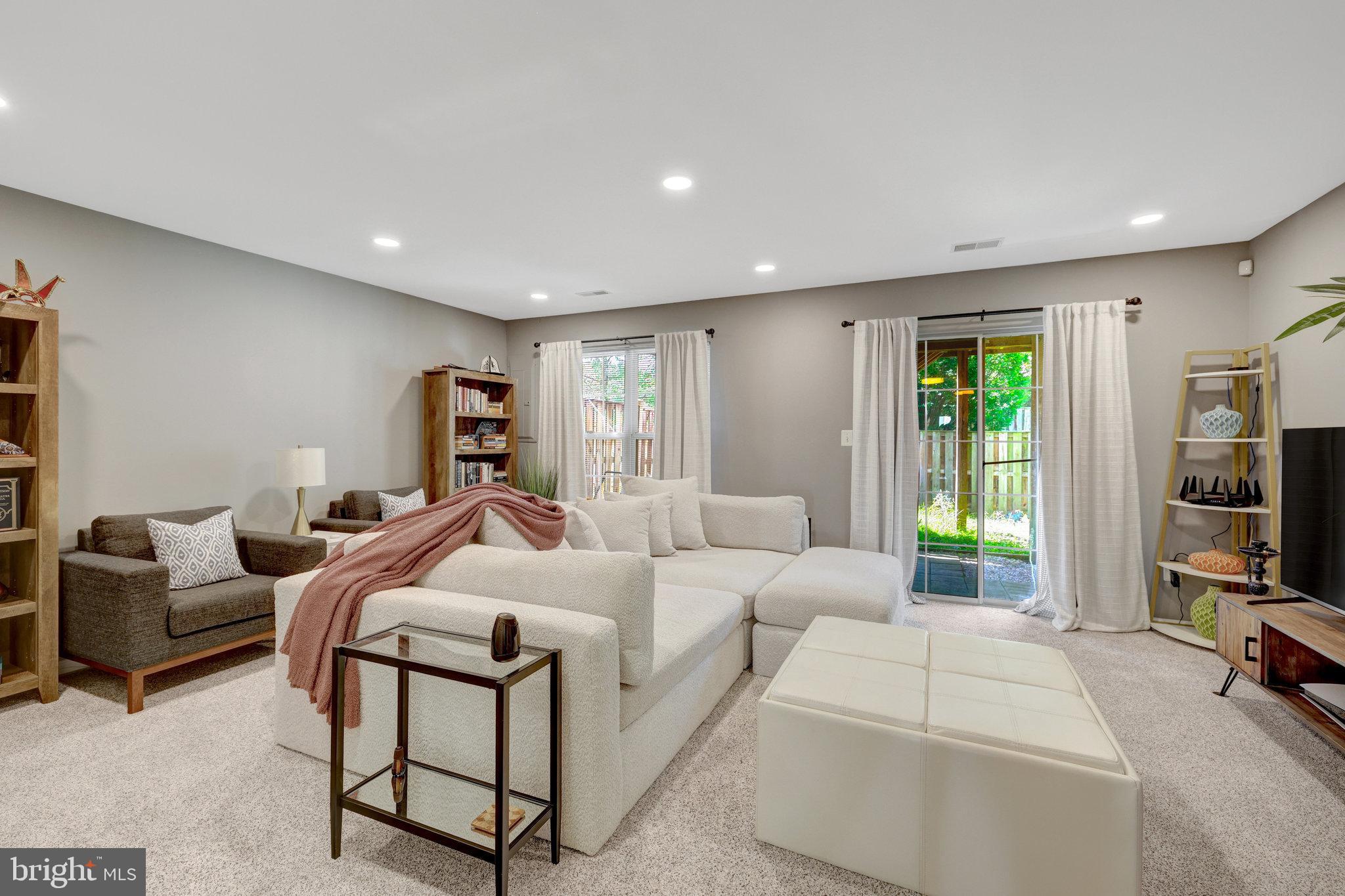 45509 Trail Run Terrace Sterling, VA 20164 - Photo 10 of 64 a bed room with furniture and a flat screen tv