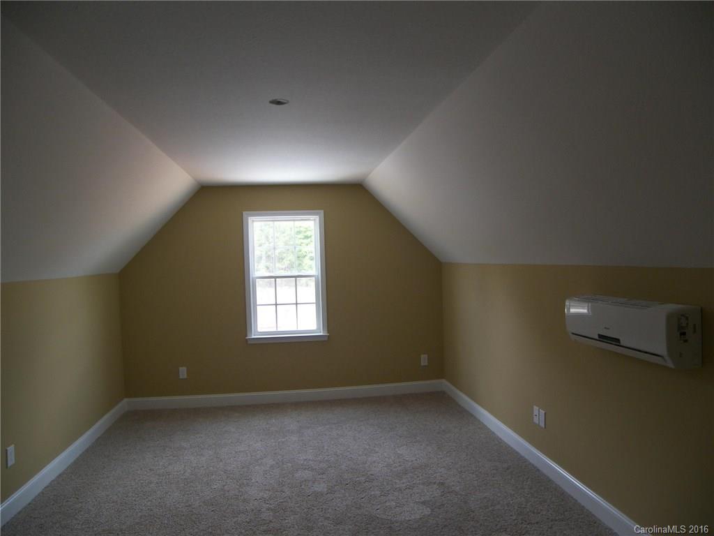 8275 Castor Road, Unit L3 Salisbury, NC 28146 - Photo 19 of 19 an empty room with a window