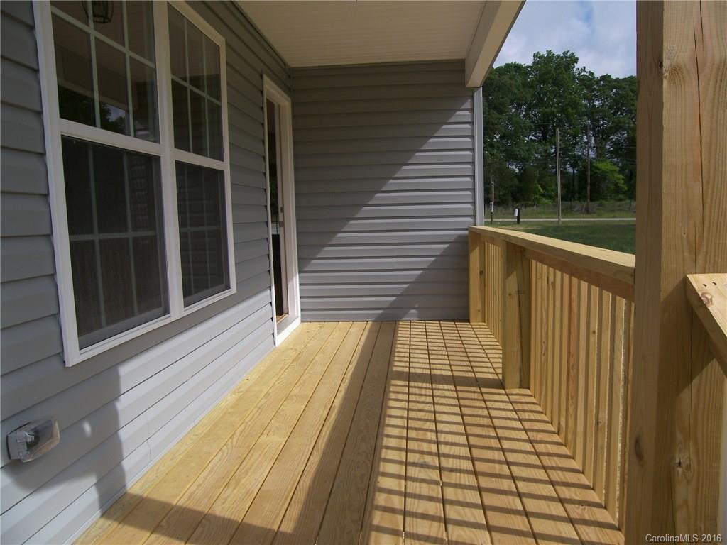 8275 Castor Road, Unit L3 Salisbury, NC 28146 - Photo 3 of 19 a view of balcony with wooden floor and floor