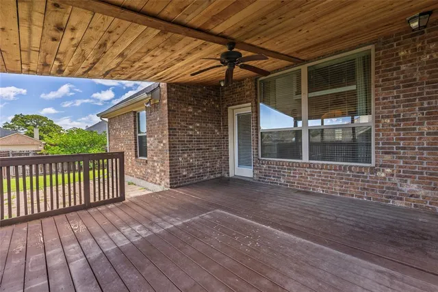a view of a front of a house with a yard