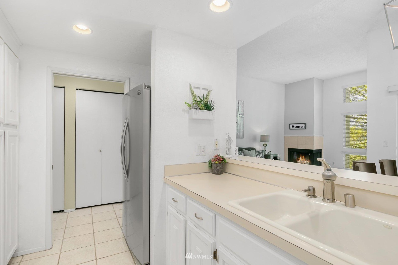 7491 Old Redmond Road, Unit 420 Redmond, WA 98052 - Photo 13 of 25 a bathroom with a sink and a mirror