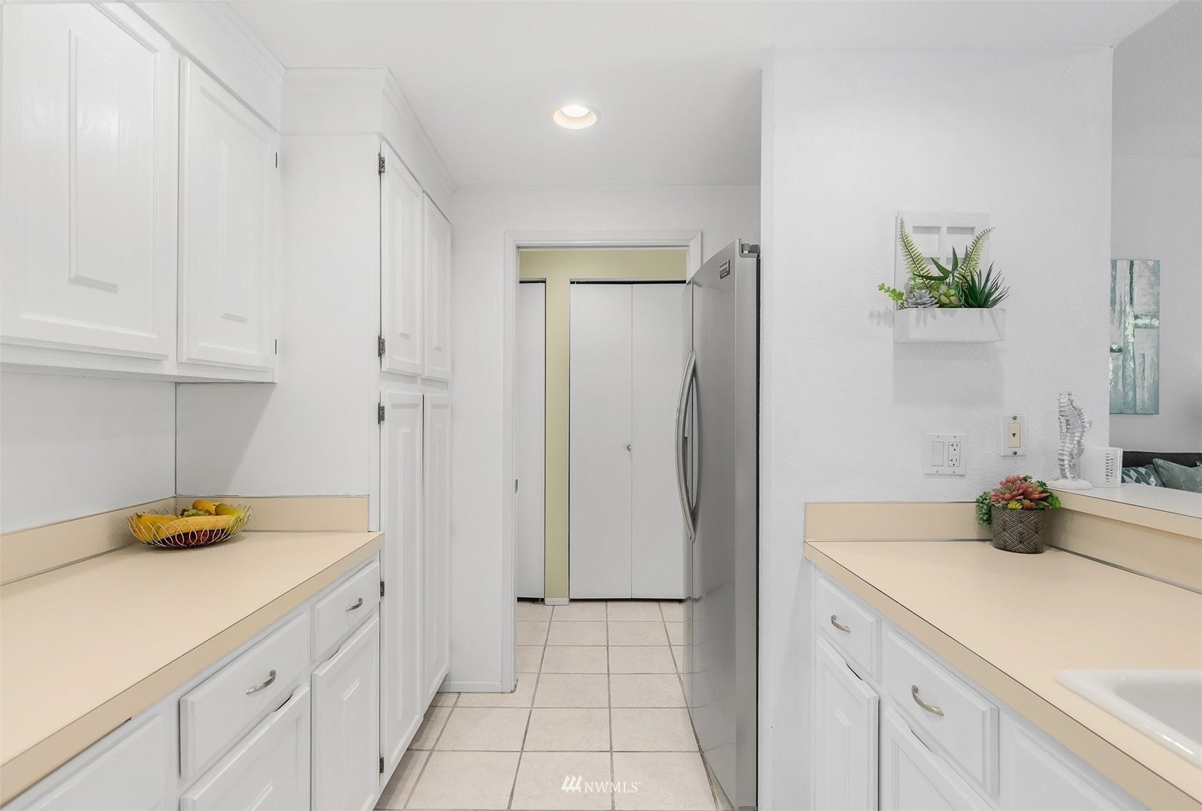 7491 Old Redmond Road, Unit 420 Redmond, WA 98052 - Photo 15 of 25 a kitchen with a sink and cabinets