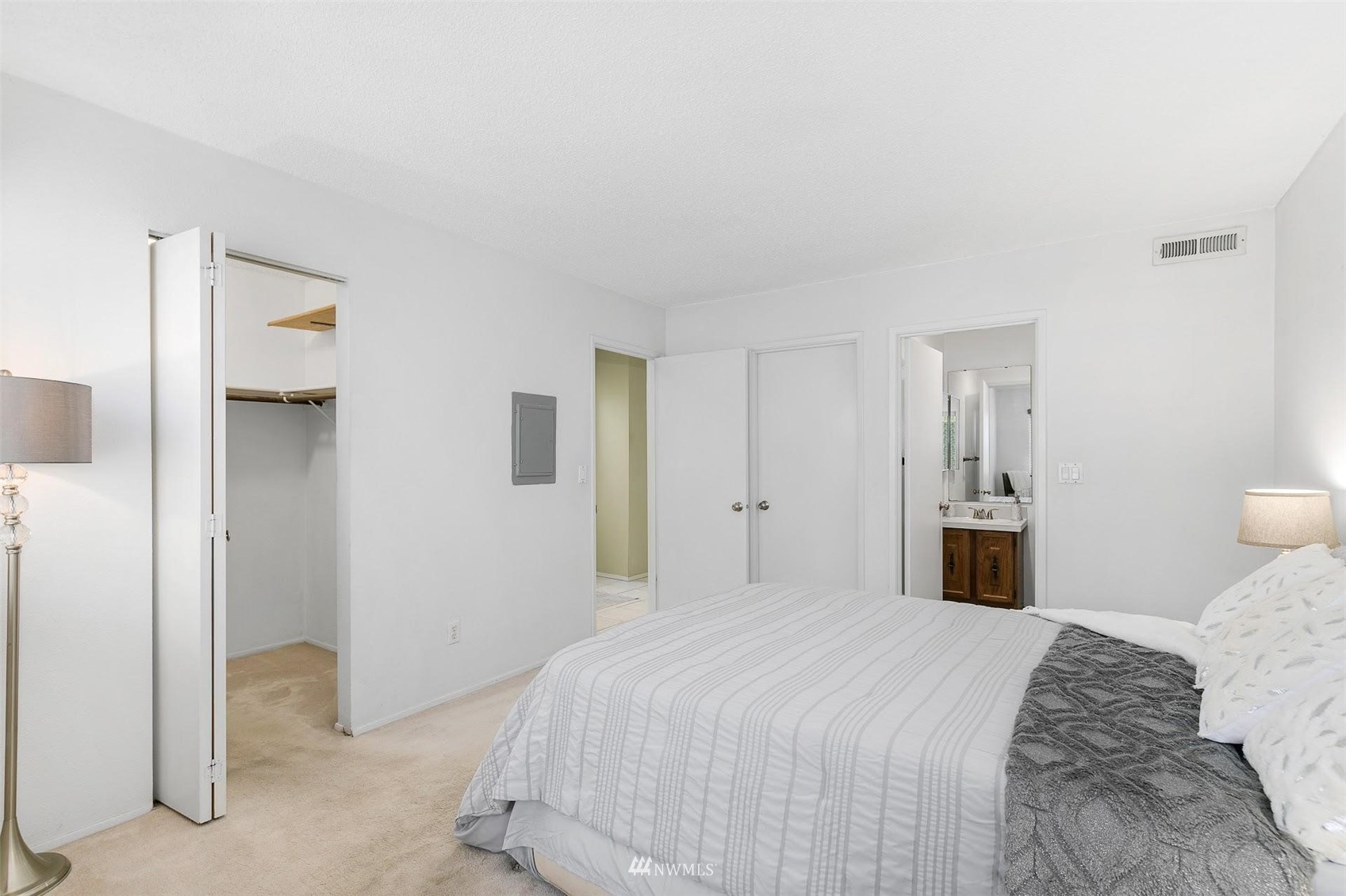 7491 Old Redmond Road, Unit 420 Redmond, WA 98052 - Photo 17 of 25 a bedroom with a bed and closet