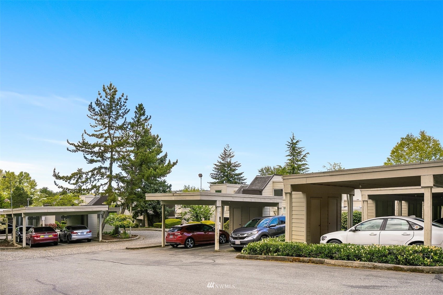 7491 Old Redmond Road, Unit 420 Redmond, WA 98052 - Photo 23 of 25 a car parked in front of a building