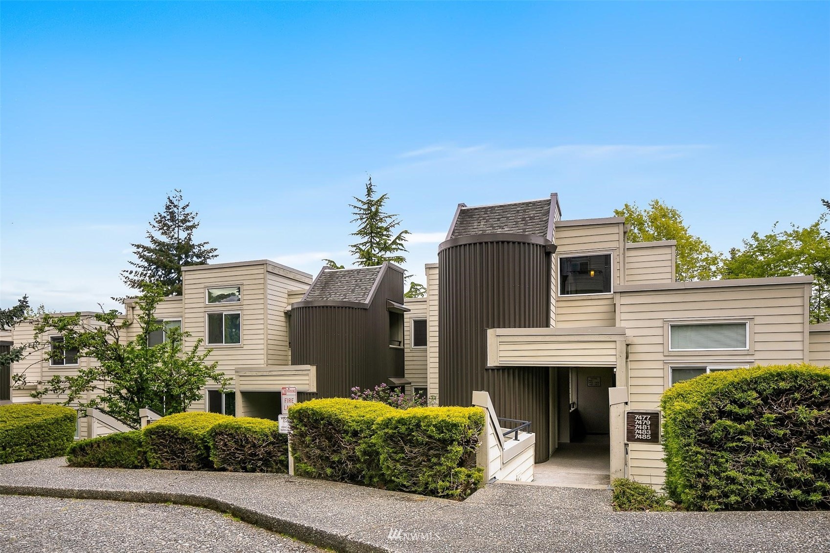 7491 Old Redmond Road, Unit 420 Redmond, WA 98052 - Photo 24 of 25 a front view of a house with a yard