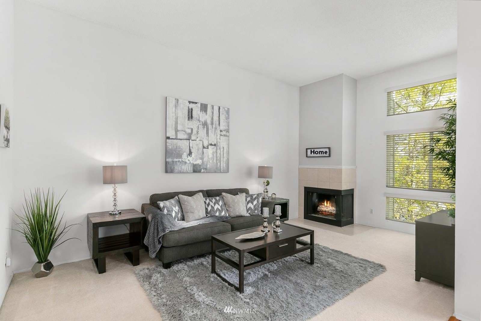 7491 Old Redmond Road, Unit 420 Redmond, WA 98052 - Photo 6 of 25 a living room with furniture and a fireplace