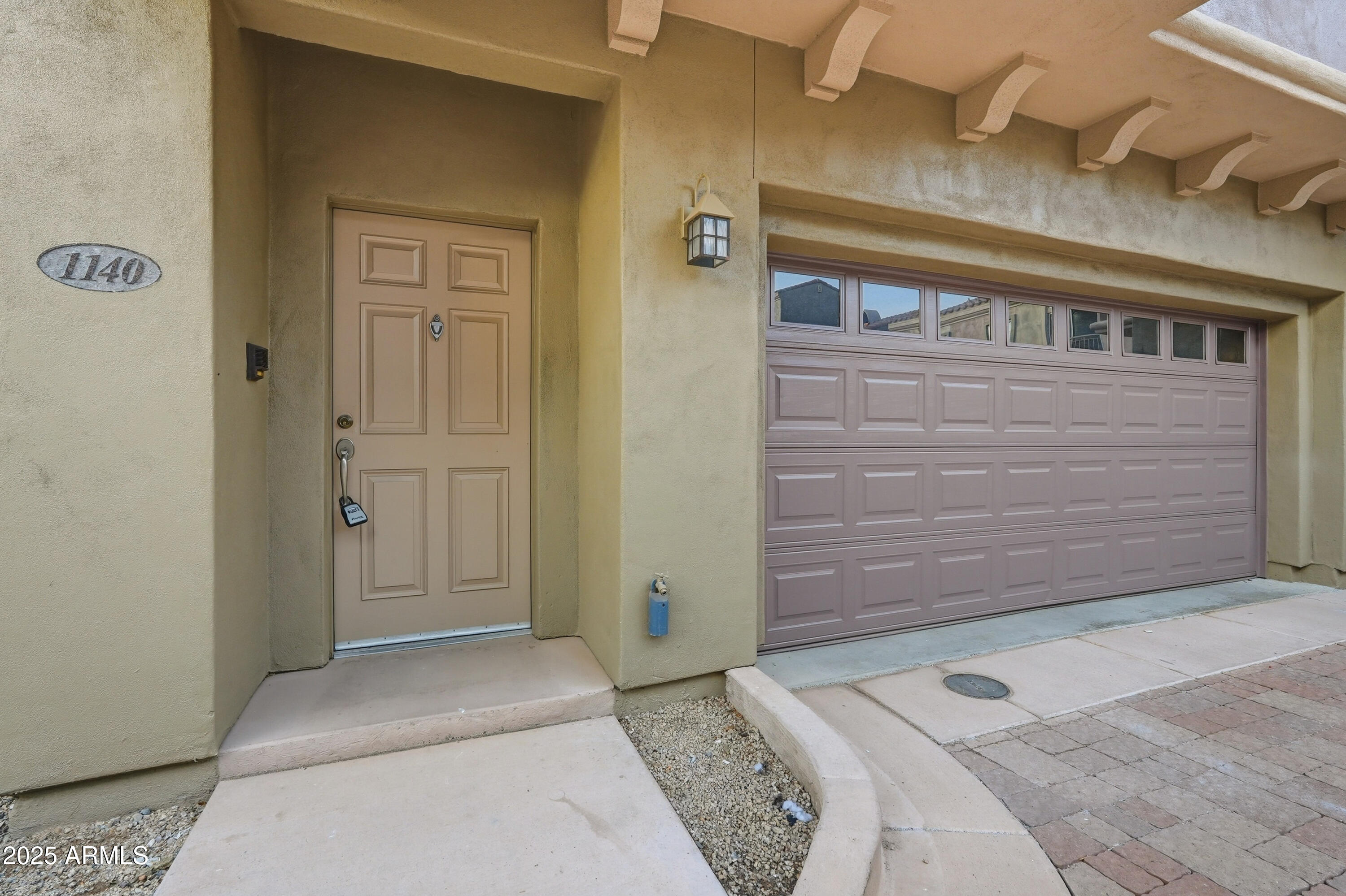 3935 East Rough Rider Road, Unit 1140 Phoenix, AZ 85050 - Photo 16 of 24 a view of front door