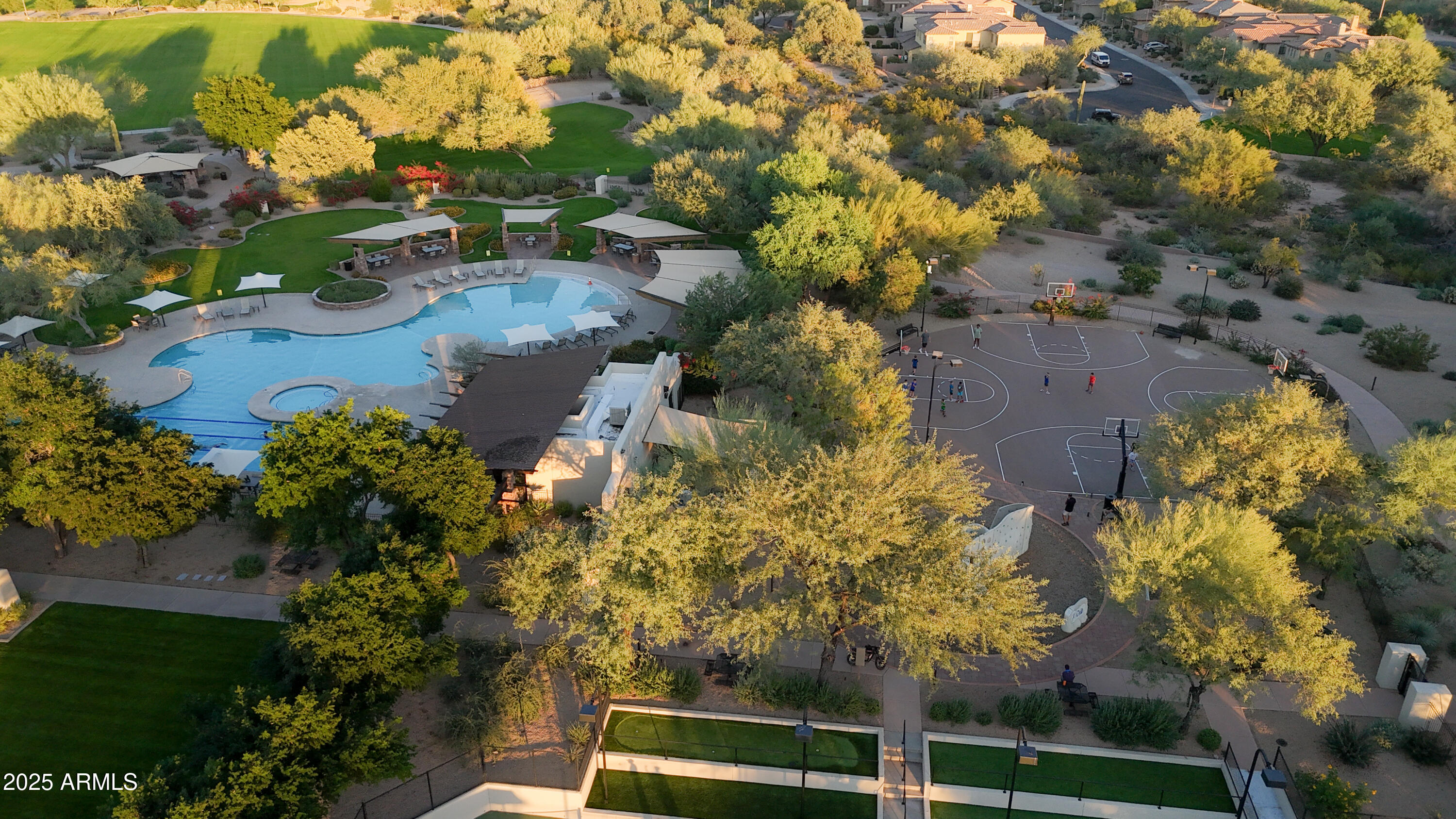 3935 East Rough Rider Road, Unit 1140 Phoenix, AZ 85050 - Photo 24 of 24 an aerial view of residential houses with outdoor space