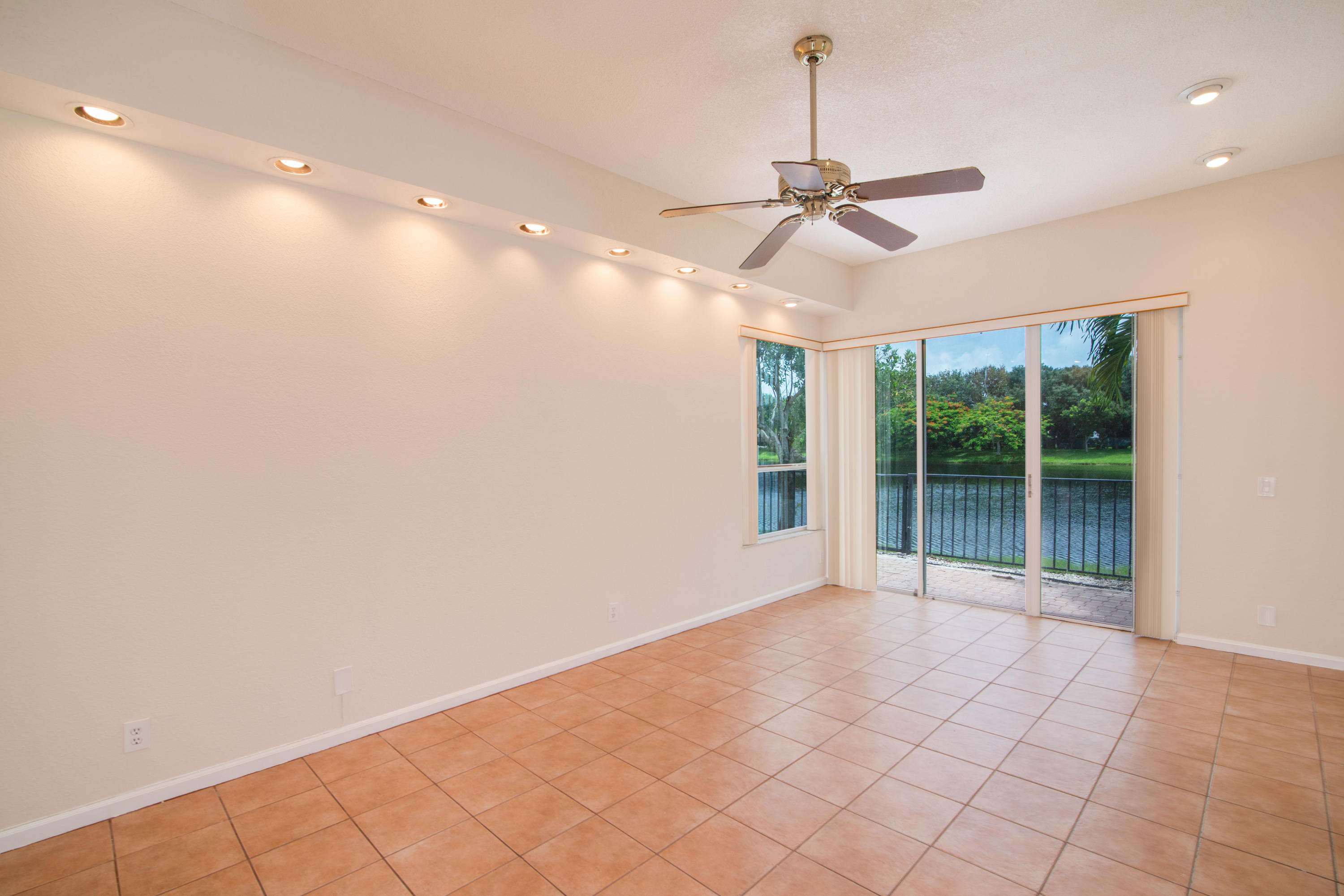 23177 Via Stel Boca Raton, FL 33433 - Photo 10 of 34 a view of an empty room with a window