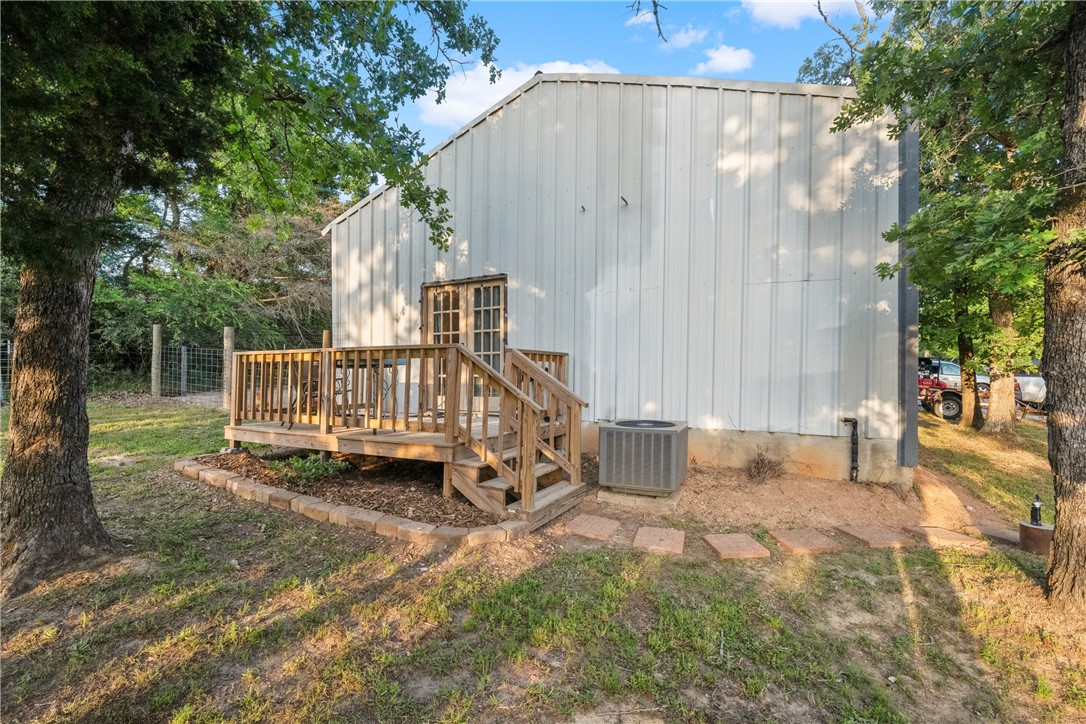 740 Bridget Avenue Buffalo, TX 75831 - Photo 31 of 42 a view of a chair and table in the back yard of the house