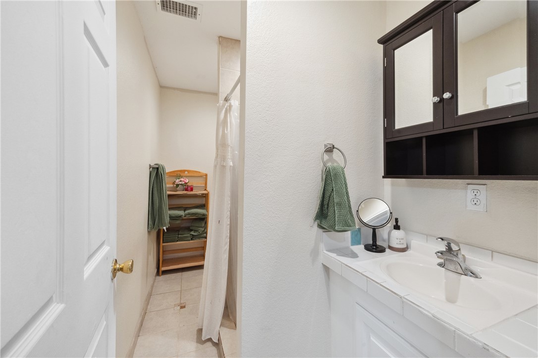 740 Bridget Avenue Buffalo, TX 75831 - Photo 36 of 42 a bathroom with a sink and a mirror