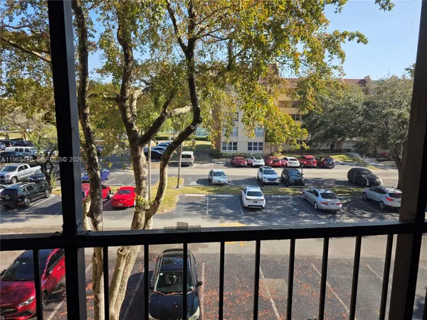 a view of swimming pool from a balcony