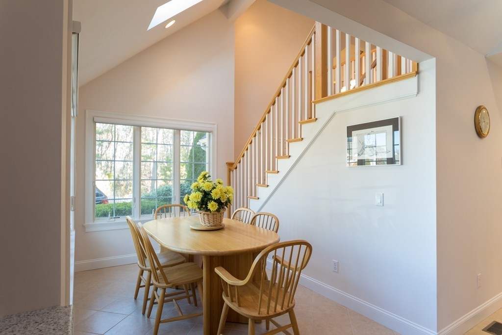64 Gold Leaf Lane, Unit 64 Mashpee, MA 02649 - Photo 10 of 28 a view of a dining room with furniture and a window