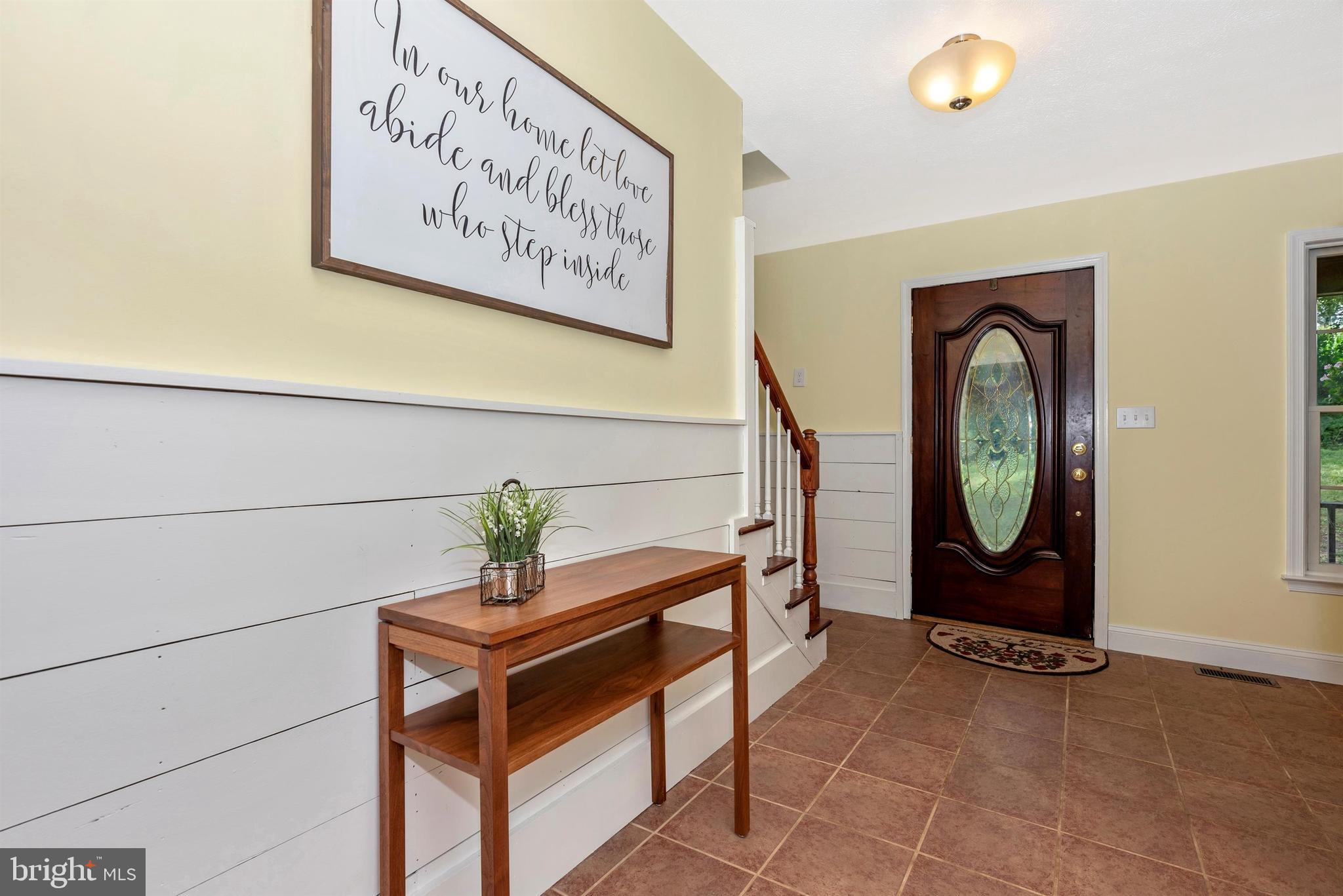1562 Fridinger Mill Road Westminster, MD 21157 - Photo 12 of 37 Foyer with shiplap & ceramic tile