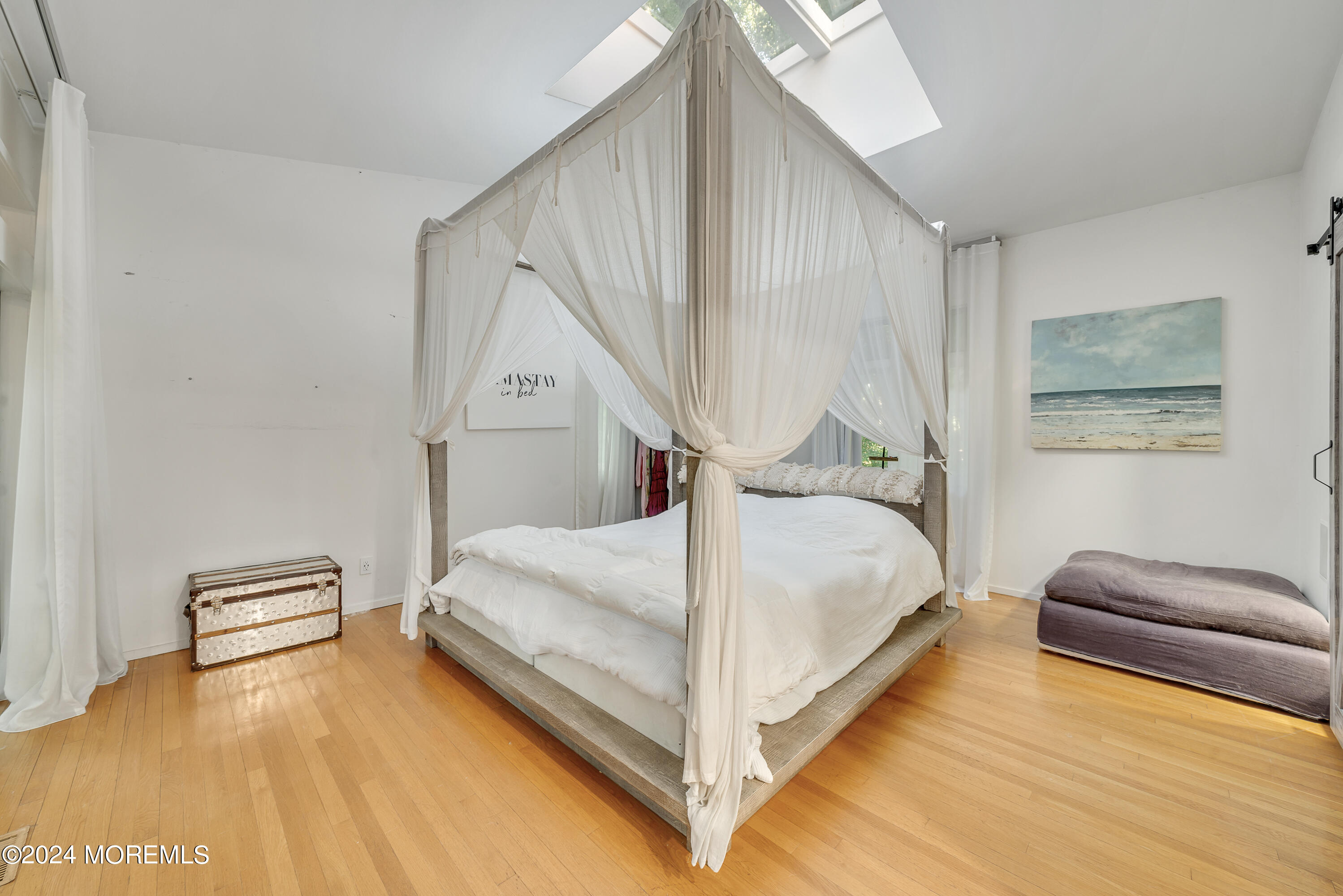 77 Telegraph Hill Road Holmdel, NJ 07733 - Photo 14 of 31 a bed room with a bed and a couch