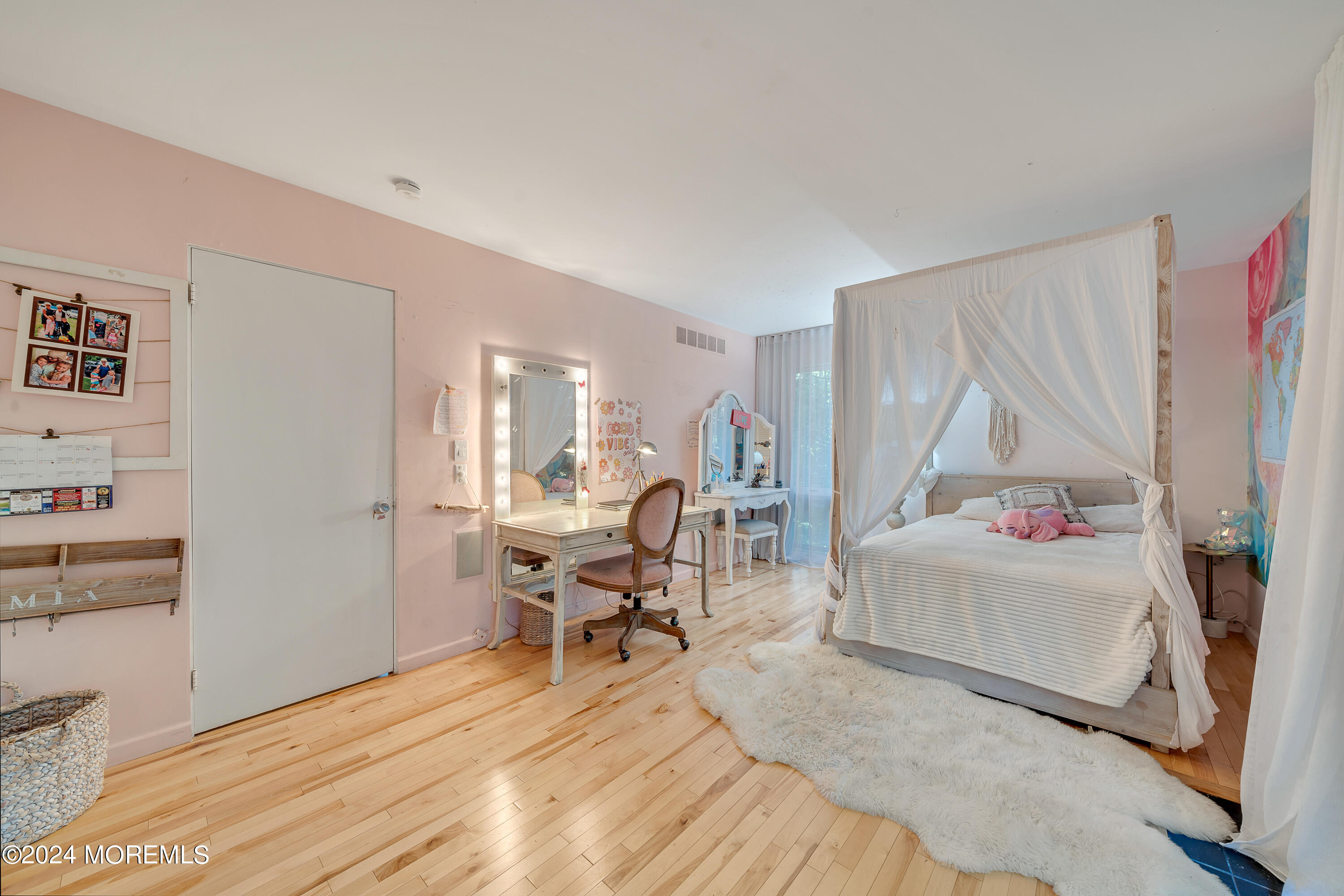 77 Telegraph Hill Road Holmdel, NJ 07733 - Photo 19 of 31 a living room with furniture and a wooden floor