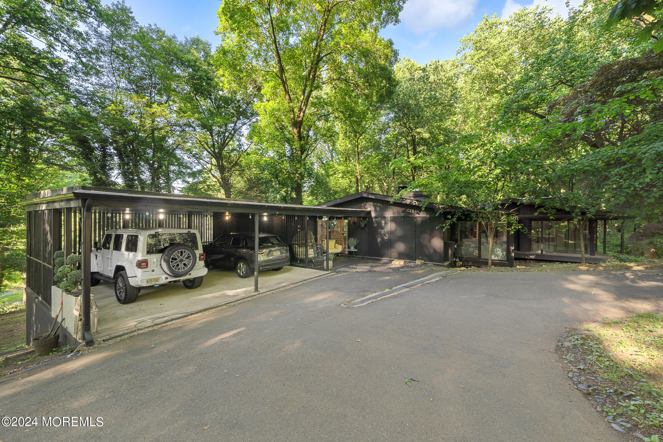 77 Telegraph Hill Road Holmdel, NJ 07733 - Photo 2 of 31 a view of a car parked in front of a house