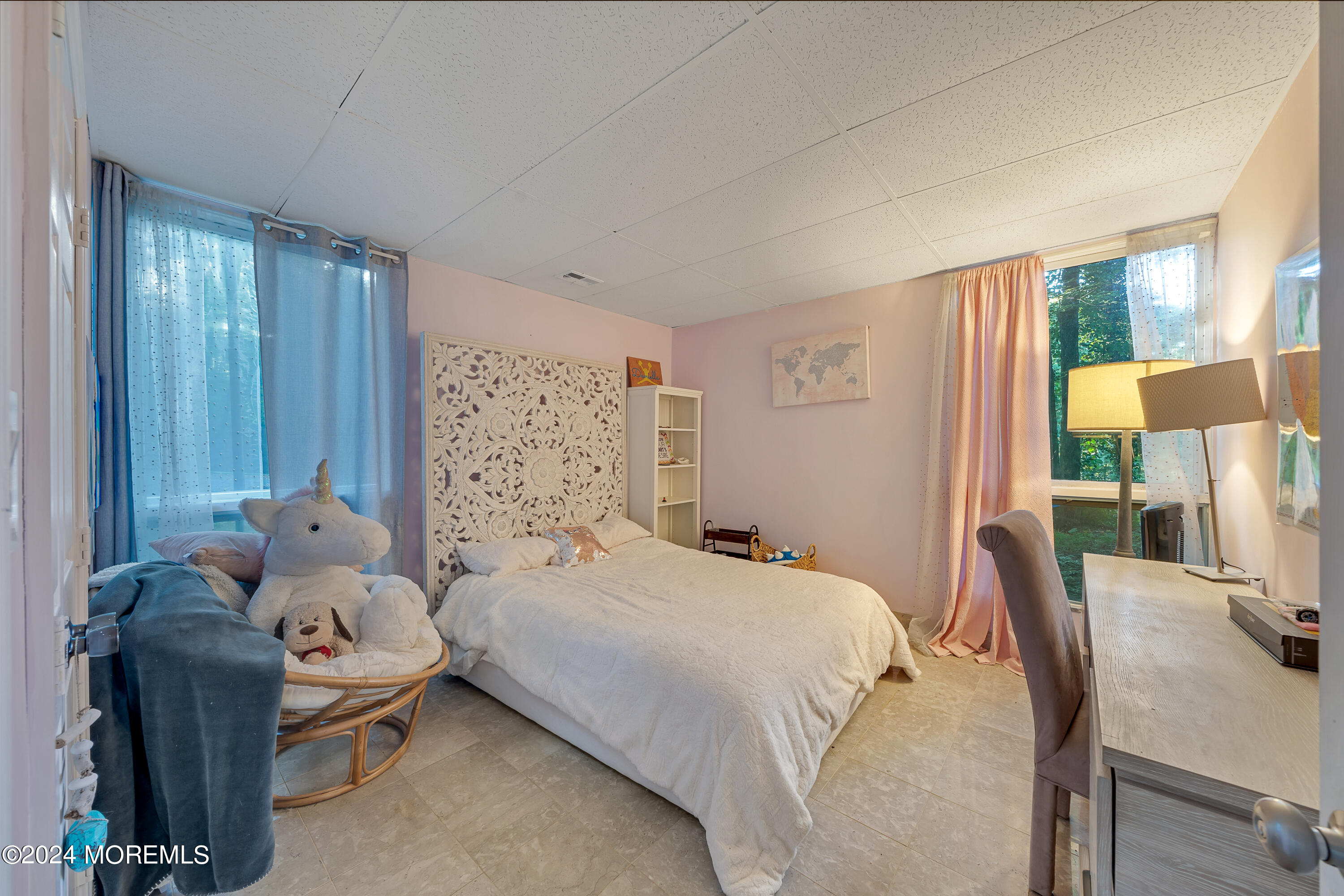 77 Telegraph Hill Road Holmdel, NJ 07733 - Photo 25 of 31 a bedroom with a bed and large windows