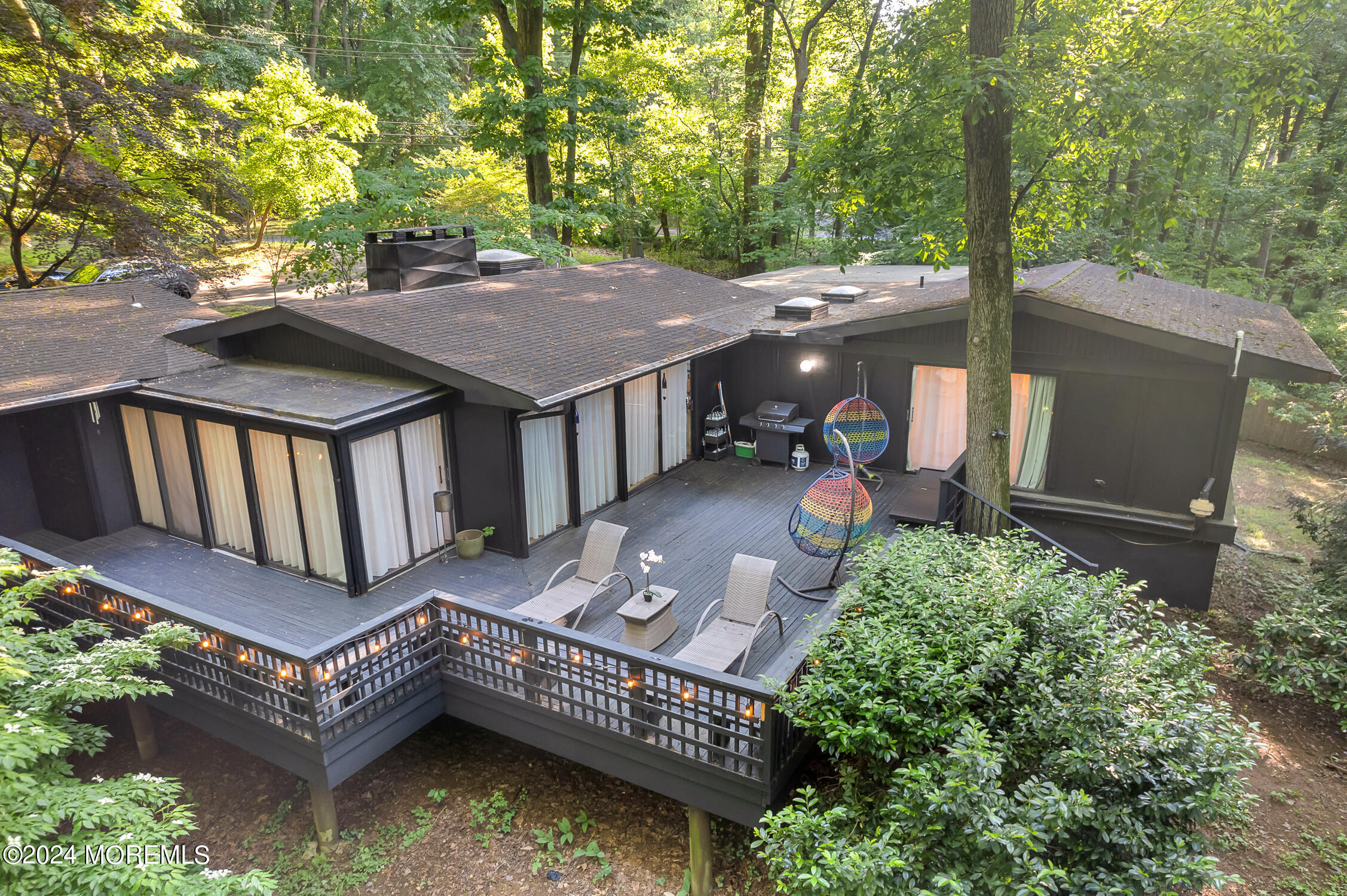 77 Telegraph Hill Road Holmdel, NJ 07733 - Photo 27 of 31 aerial view of a house with pool and chairs