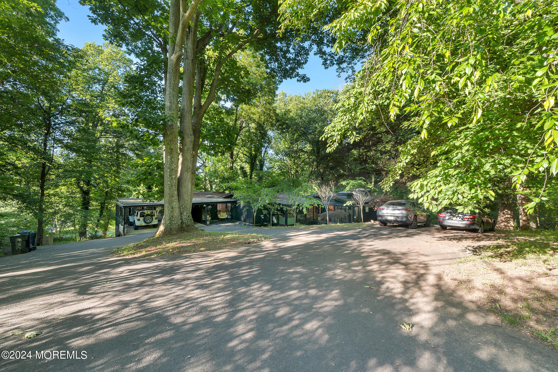 77 Telegraph Hill Road Holmdel, NJ 07733 - Photo 30 of 31 a view of a house with a tree in front of it