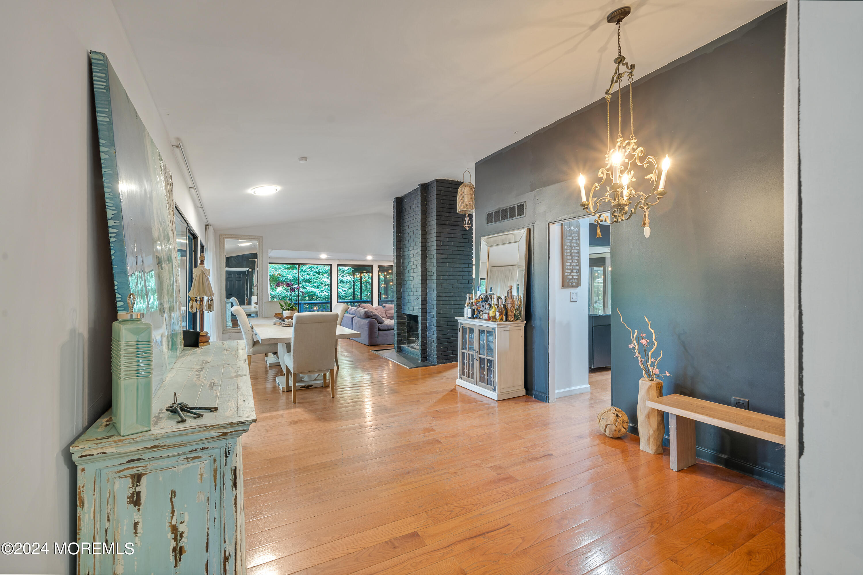 77 Telegraph Hill Road Holmdel, NJ 07733 - Photo 7 of 31 a view of a dining room with furniture and chandelier