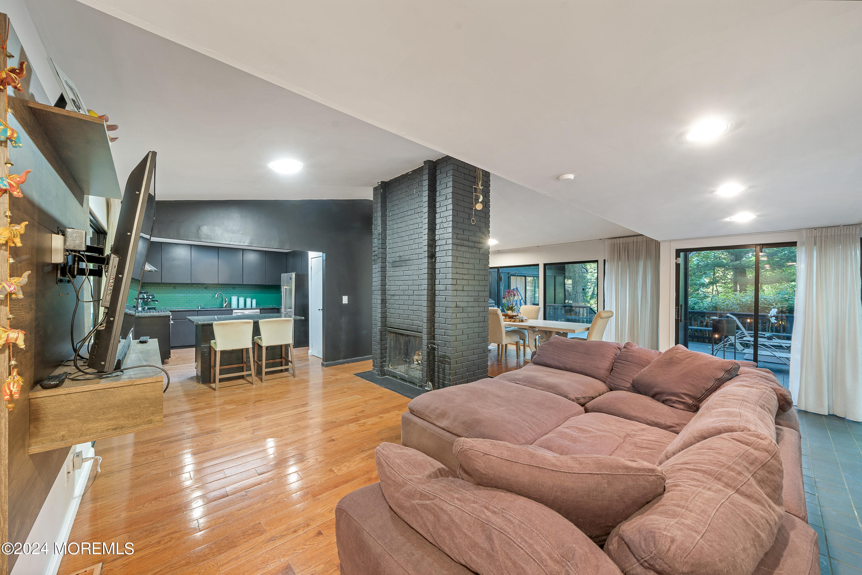 77 Telegraph Hill Road Holmdel, NJ 07733 - Photo 8 of 31 a living room with furniture and a large window