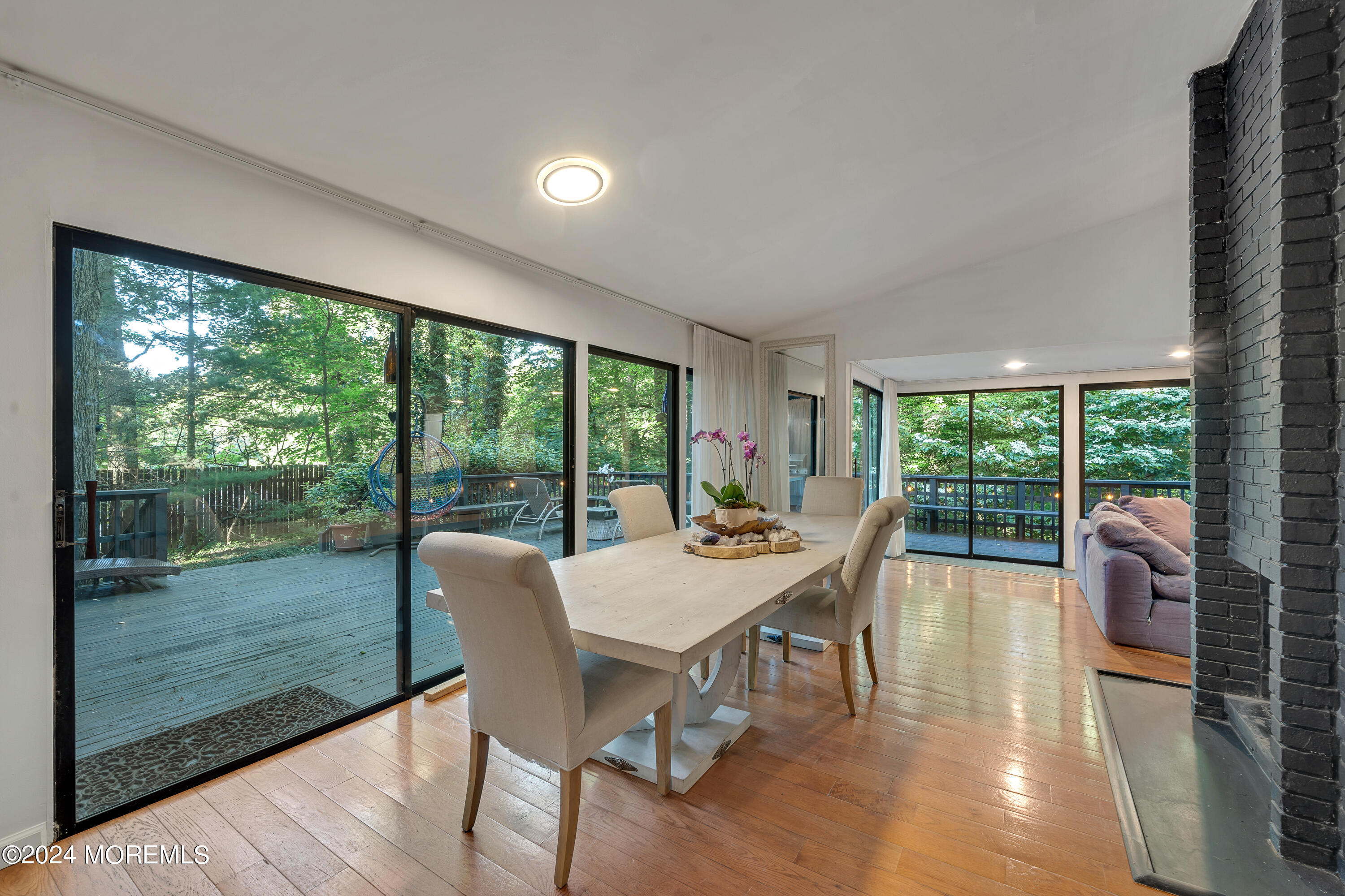 77 Telegraph Hill Road Holmdel, NJ 07733 - Photo 10 of 31 a view of a dining room with furniture window and wooden floor