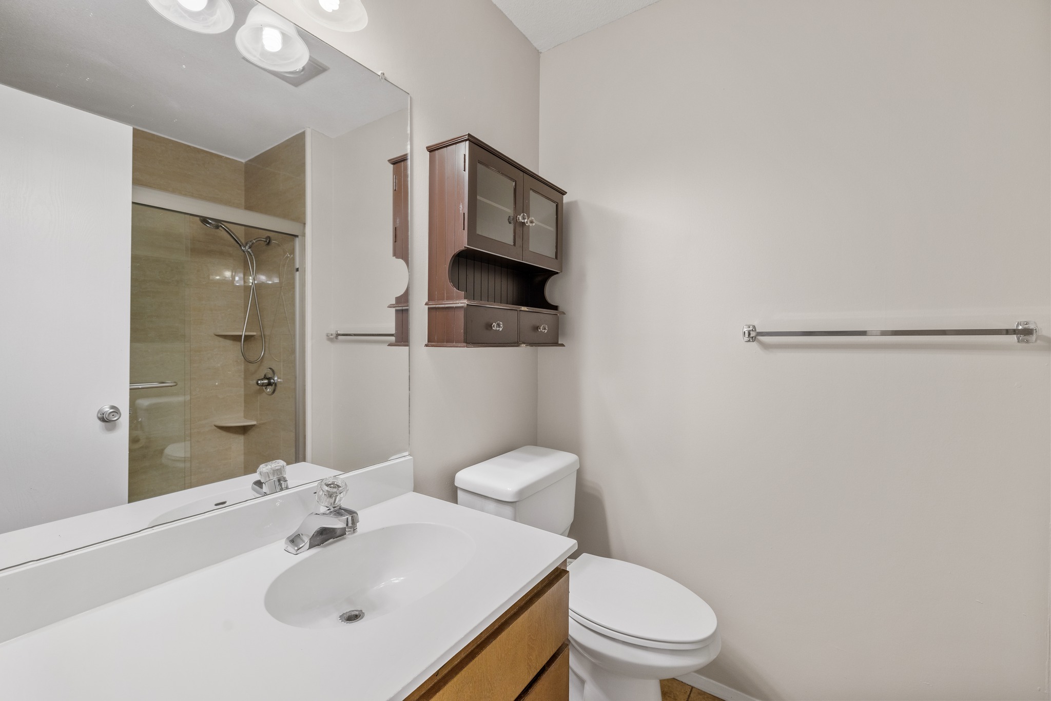 1101 Huntridge Drive Austin, TX 78758 - Photo 27 of 30 Full bath with vanity and a stall shower