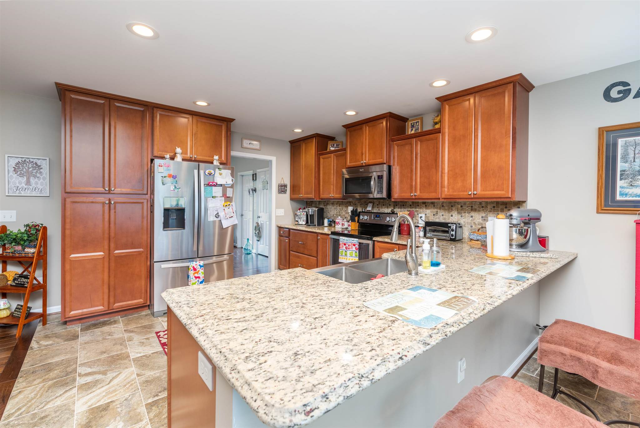 212 Lyles Road Raphine, VA 24472 - Photo 13 of 69 a kitchen with stainless steel appliances granite countertop a sink refrigerator and cabinets