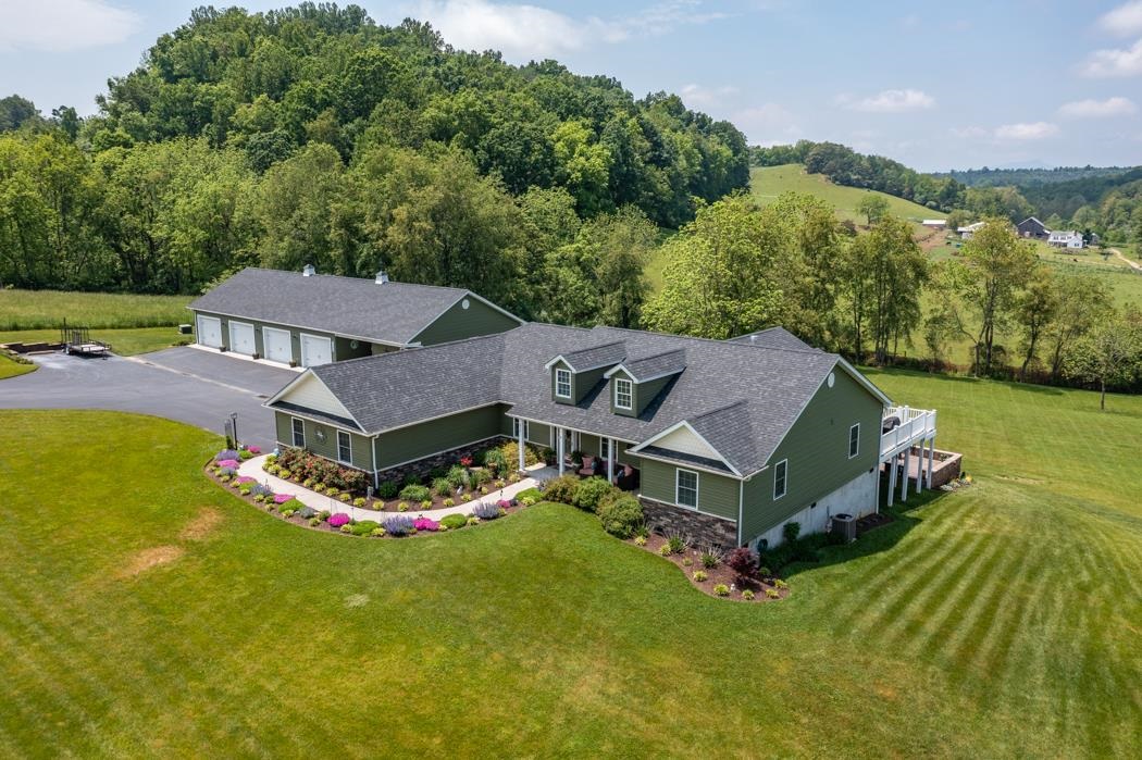 212 Lyles Road Raphine, VA 24472 - Photo 69 of 69 an aerial view of a house with a garden and swimming pool